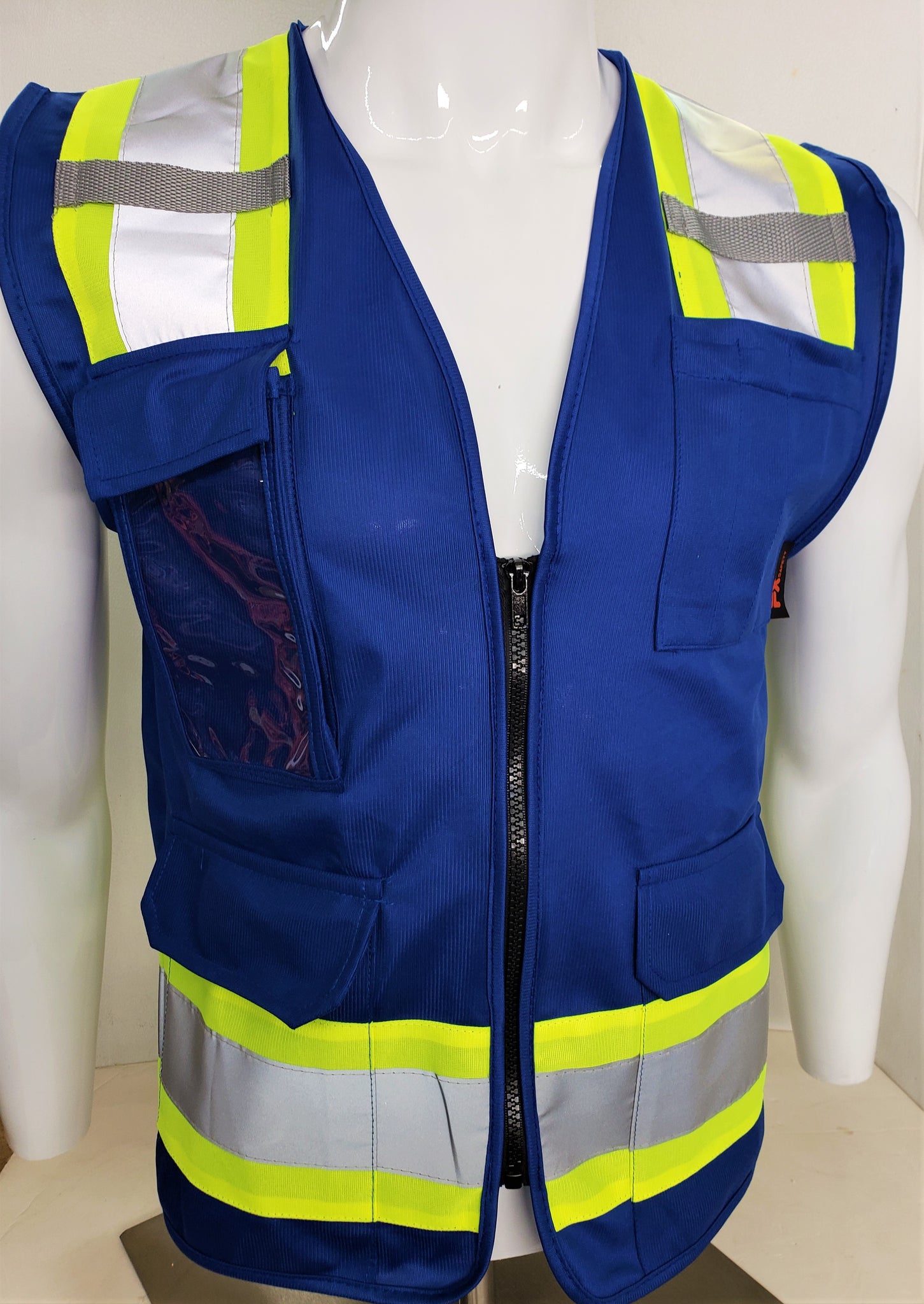 Blue safety vest with on sale pockets